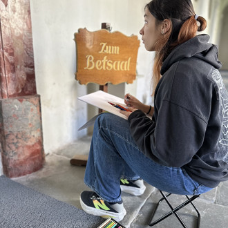 zeichnende Person
